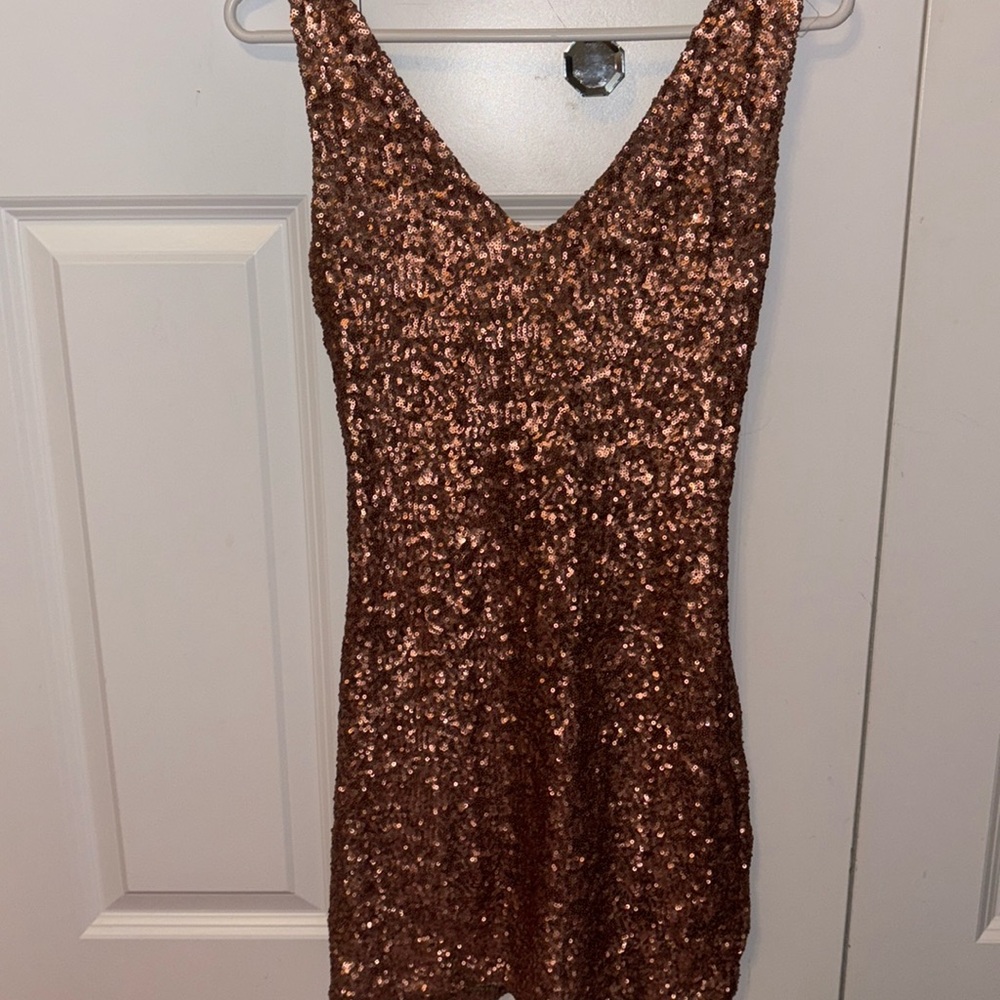 Mini sequin lace up dress